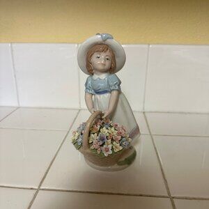 Nadal porcelain girl with flower basket